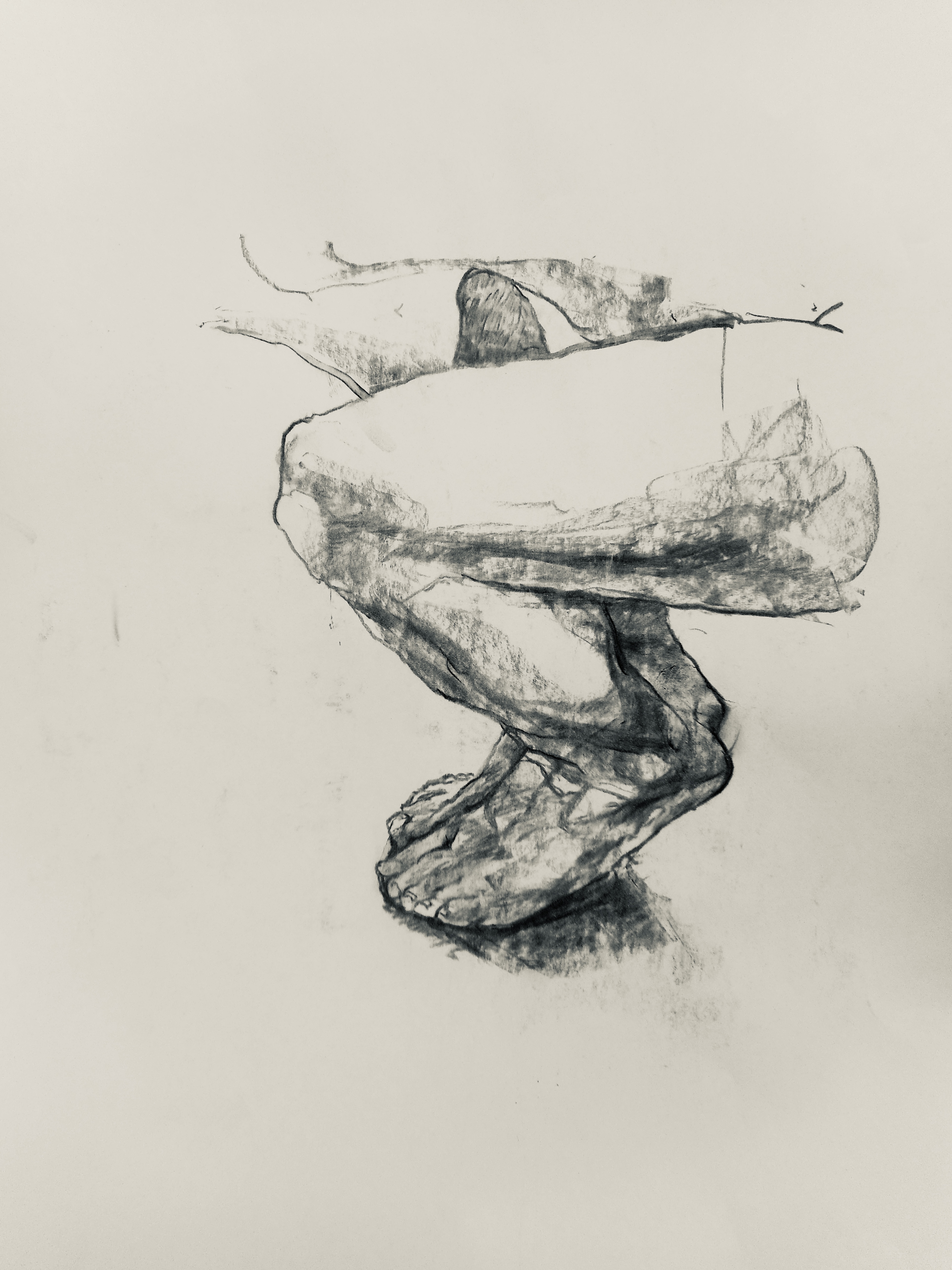 Bare legs squatting with feet together.