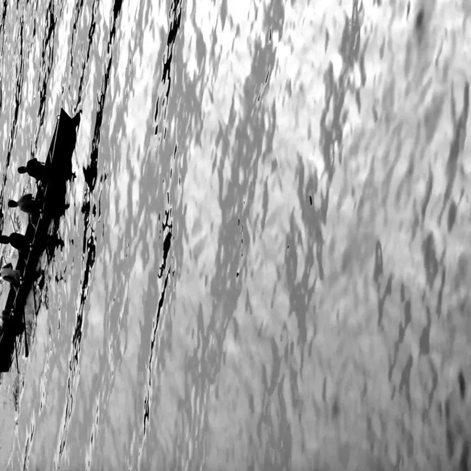 People in kayaks rowing in the river